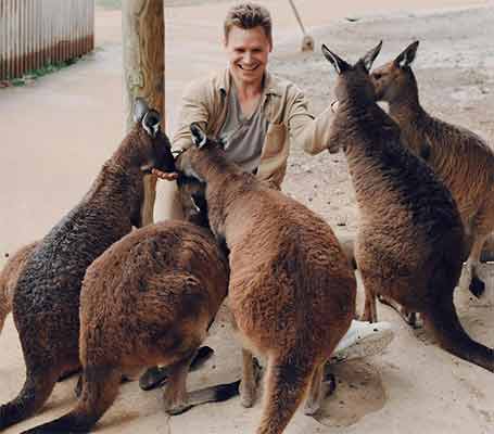 tourist with Kangaroos, Australia